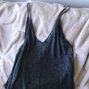 Loose Dark Grey tank with worn down edges.